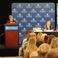 The panelist leading the order of the engineers pledge speaks